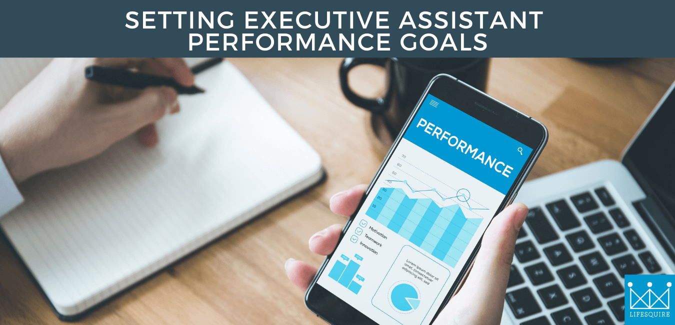 A person holding a cell phone with graphs on the screen, the title of the blog post is in a box at the top: "setting executive assistant performance goals"